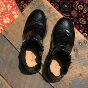 Clarks Glossy Black Ankle Boots